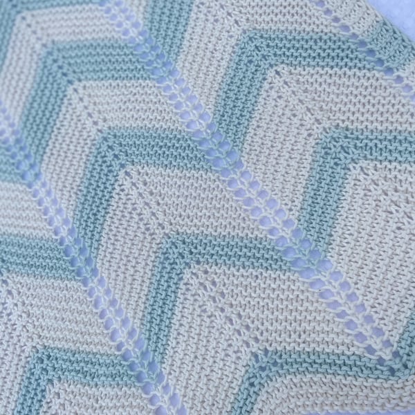 Pale blue green and off white striped baby blanket in cotton yarn 