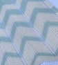 Pale blue green and off white striped baby blanket in cotton yarn 