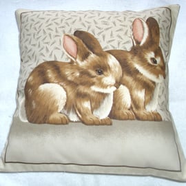 Pretty little Bunnies sitting together cushion