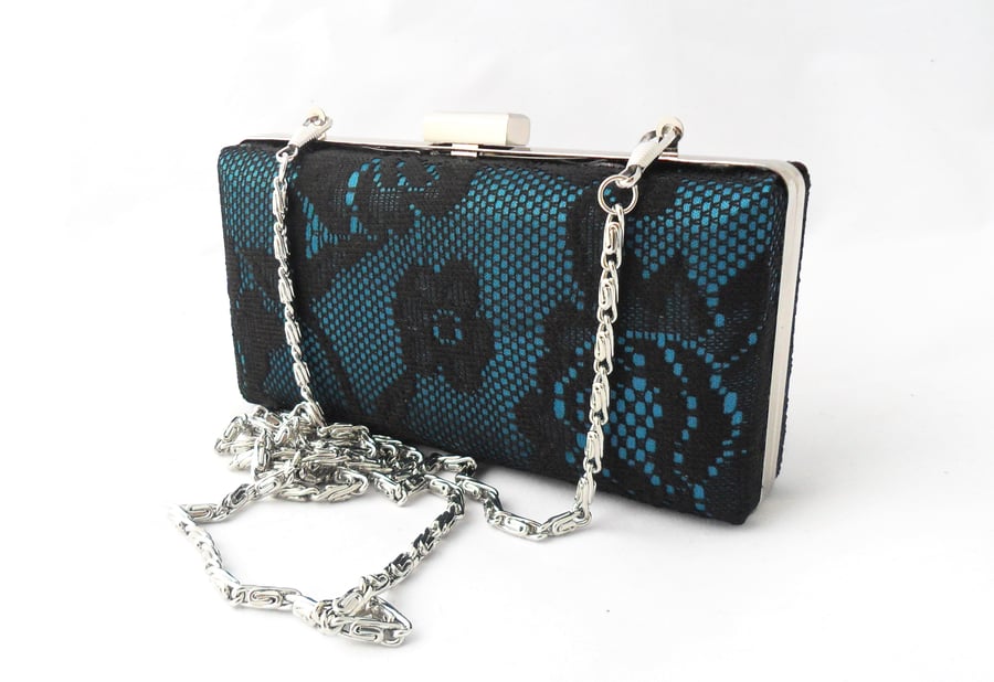 Lace clutch in teal and black. Minaudiere clutch
