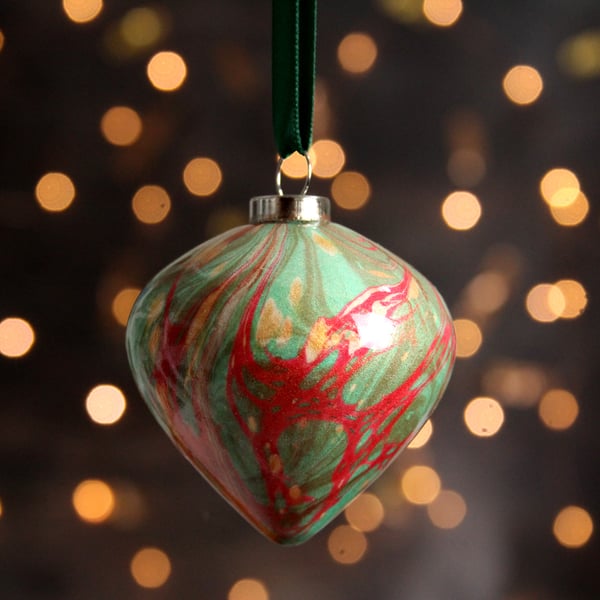 Festive red and green marbled pottery bauble