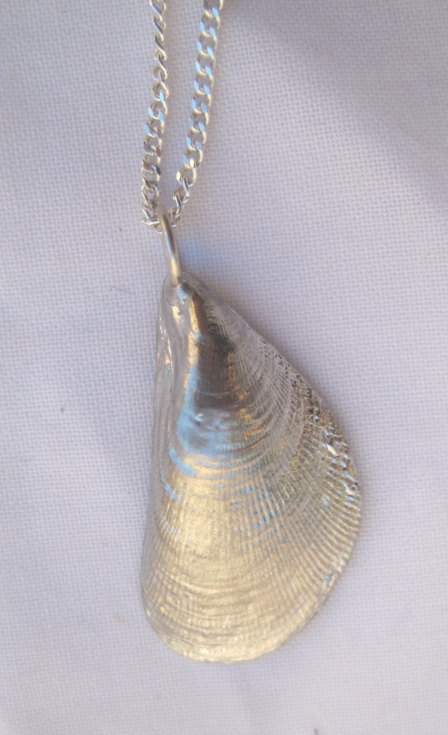 Textured mussel shell pewter pendant necklace with sterling silver chain