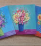 Three flower vase greetings cards