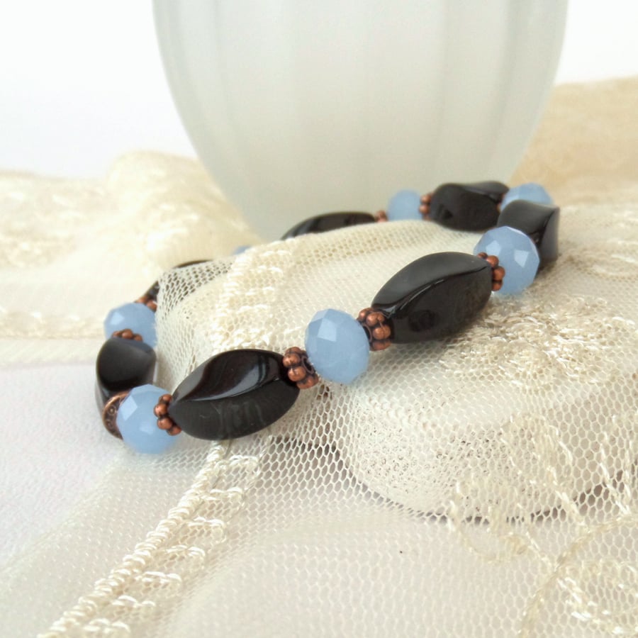 Gemstone and copper stretchy bracelet, with black onyx & blue crystal