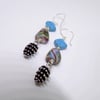 Lamp work bead and pine cone charm dangle earrings