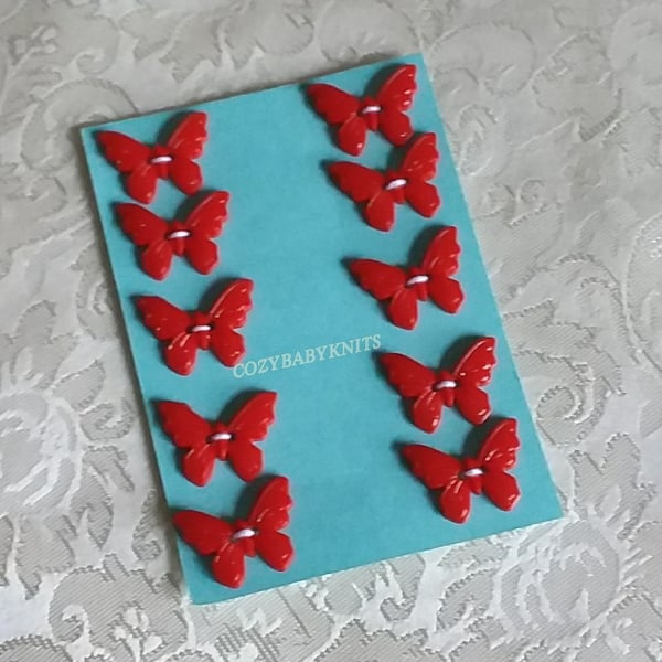 Red butterfly plastic buttons