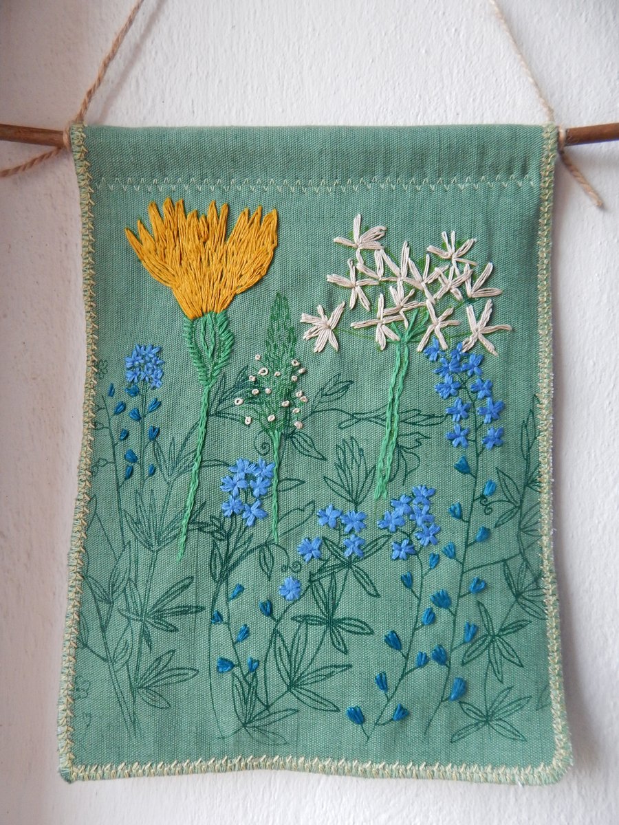 Forget me nots and wild flowers- Dark green hanger on a piece of Willow