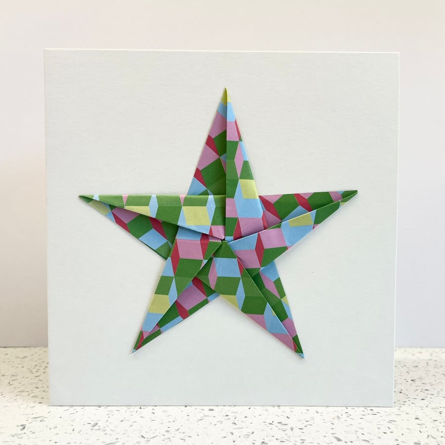 Christmas cards featuring colourful origami festive stars