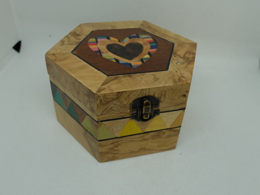 Hexagonal lidded box veneered with hearts and triangles