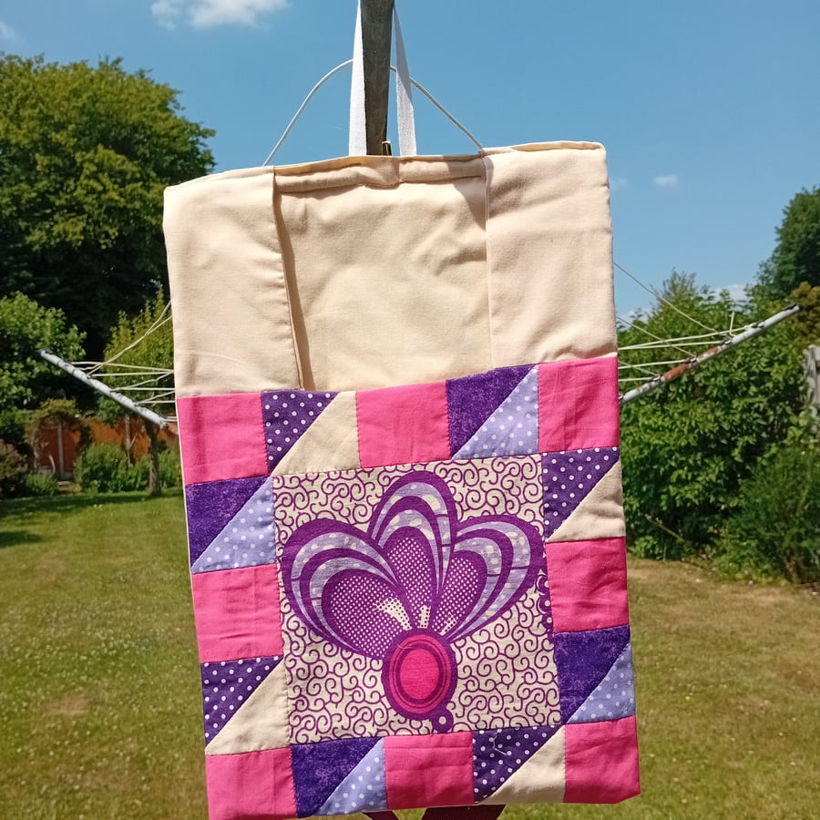 Peg bag. Patchwork peg bag in cerise, purple, mauve and cream. Shoulder strap. 