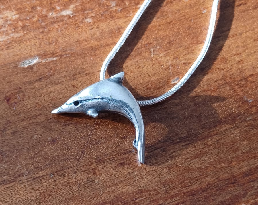 Silver dolphin pendant