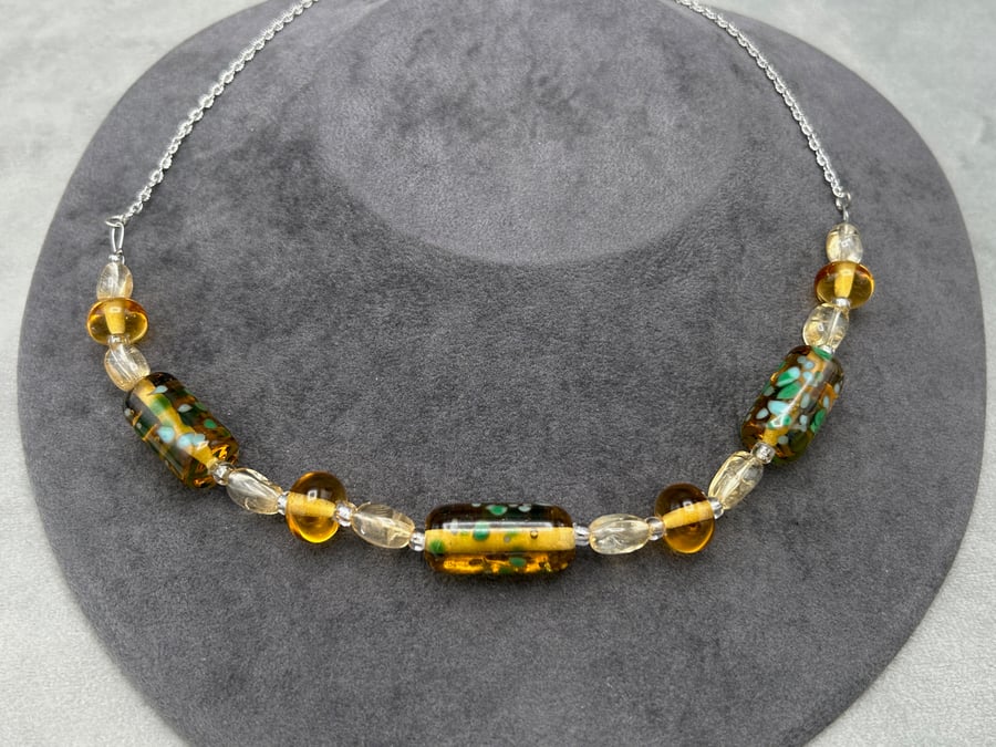 amber and green coloured lampwork glass beaded necklace with citrine stones