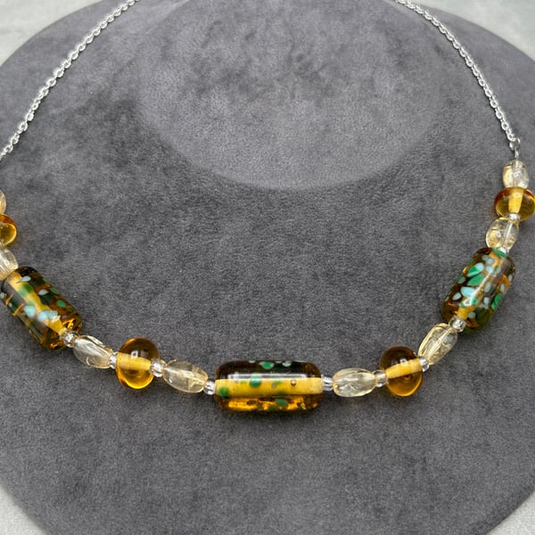amber and green coloured lampwork glass beaded necklace with citrine stones