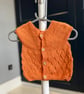 Hand-Knitted Baby Vest with Textured Pattern – Burnt Orange (0-3m)