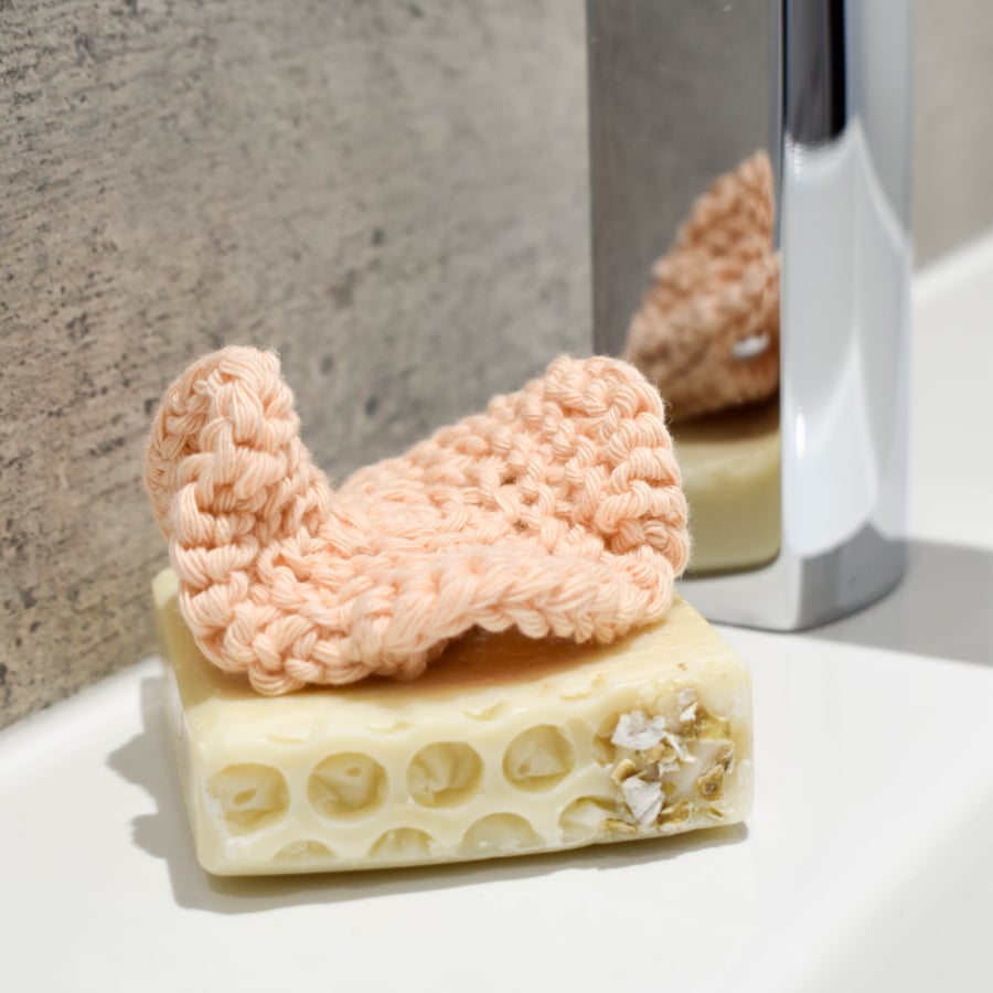 Hand knitted cotton facial scrubbie - peach