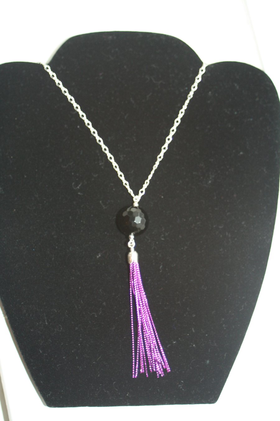 Long tasseled black onyx necklace
