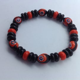 Red and black bracelet with vintage millefiori beads