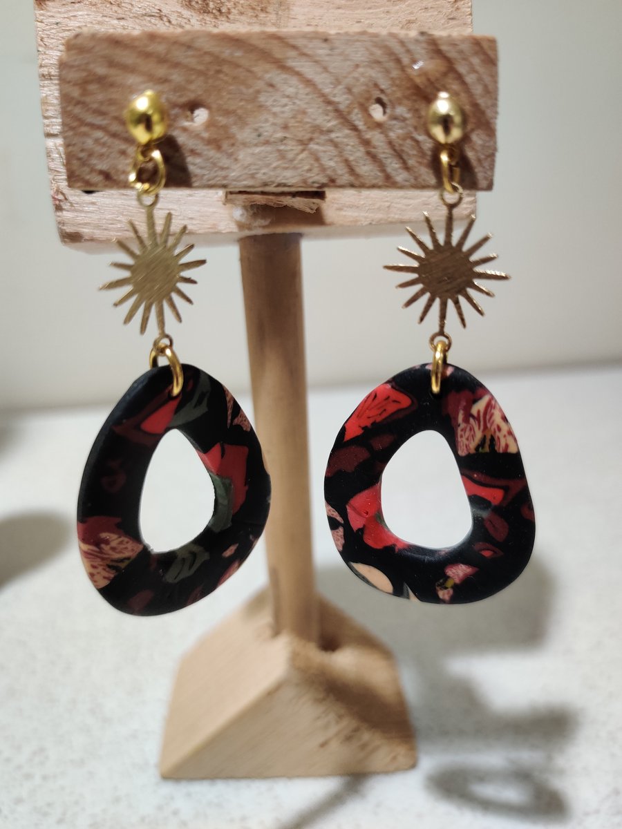 Winter floral gold hollow pebble earrings
