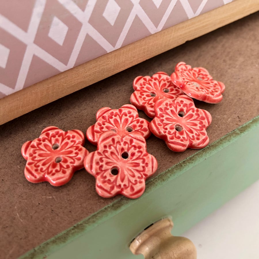 Set of six little handmade ceramic buttons red
