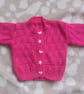 Hand knitted pink baby girls cardigan - Image 2