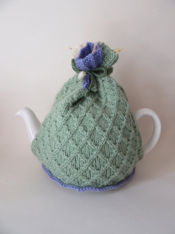 Tea cosy tea cosie - knitted pastel green with crocus flowers