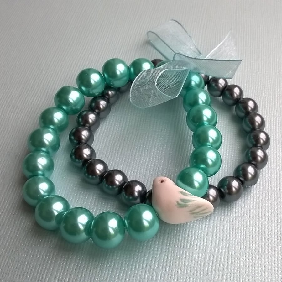 Turquoise and grey glass pearl bird bracelet