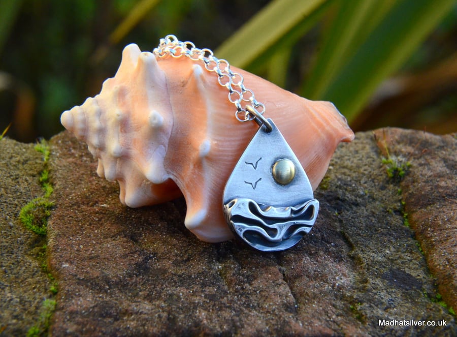 Teardrop silver beach, sea pendant, with brass sun and seagulls