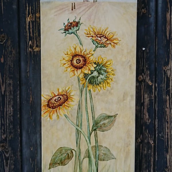 Yellow sunflower painting on narrow, vertical canvas with French fields