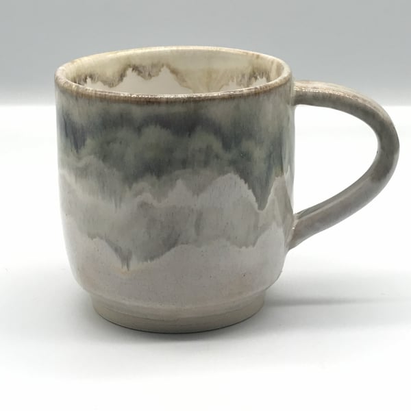 Large stoneware pottery mug finished in grey, brown, cream, white glaze.