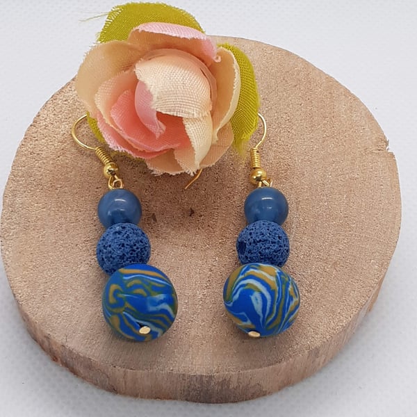 Blue, gold and white dangly earrings