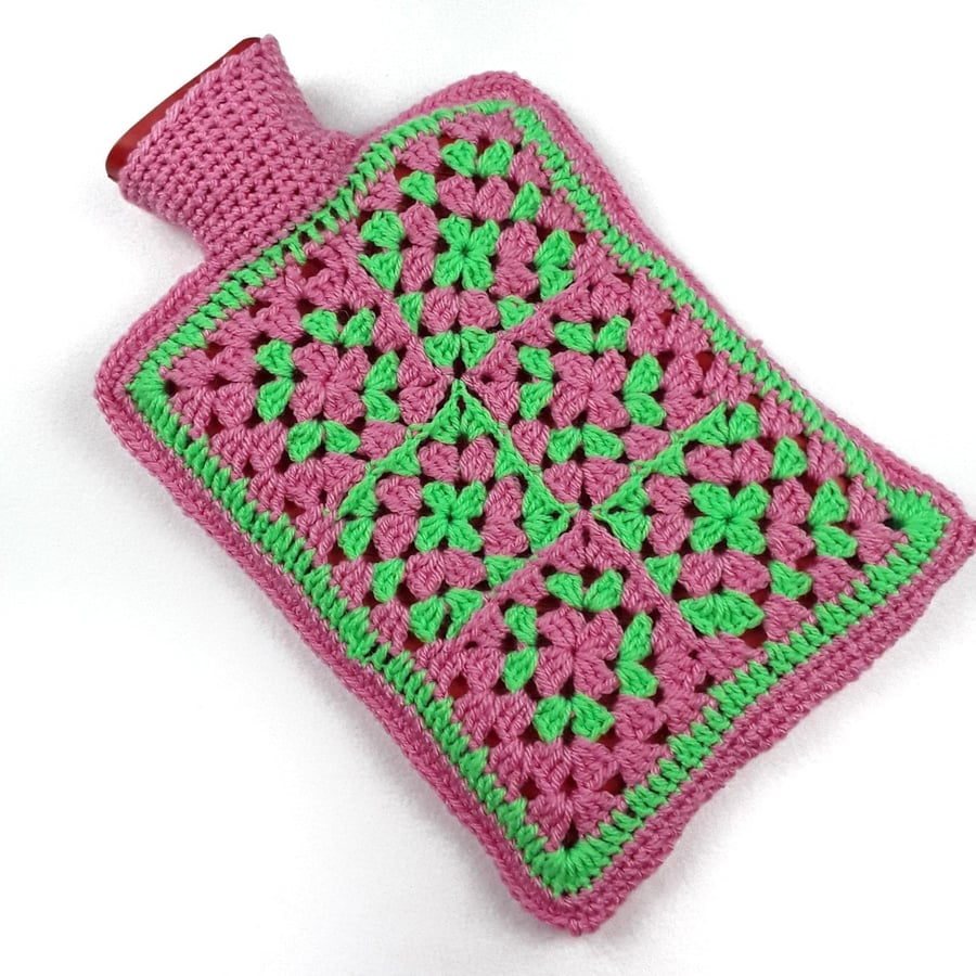 Hand crocheted granny square hot water bottle cover green and pink