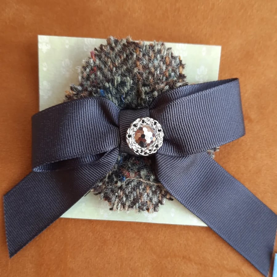 Handmade tweed brooch with silver button and bow