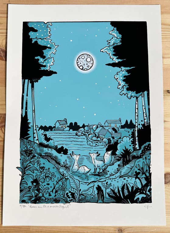 Foxes in the moonlight