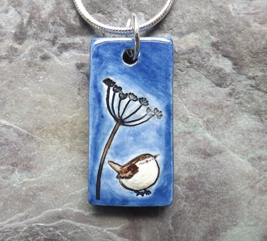 Handmade Ceramic Wren under Cow Parsley pendant in blue and brown