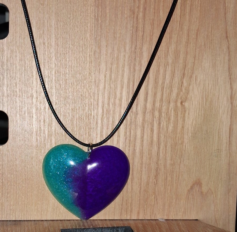 Handmade resin heart pendant on  black waxed cord