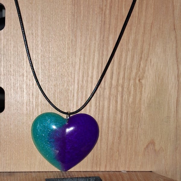 Handmade resin heart pendant on  black waxed cord