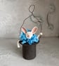 Paper mache hanging white bunny in top hat ornament