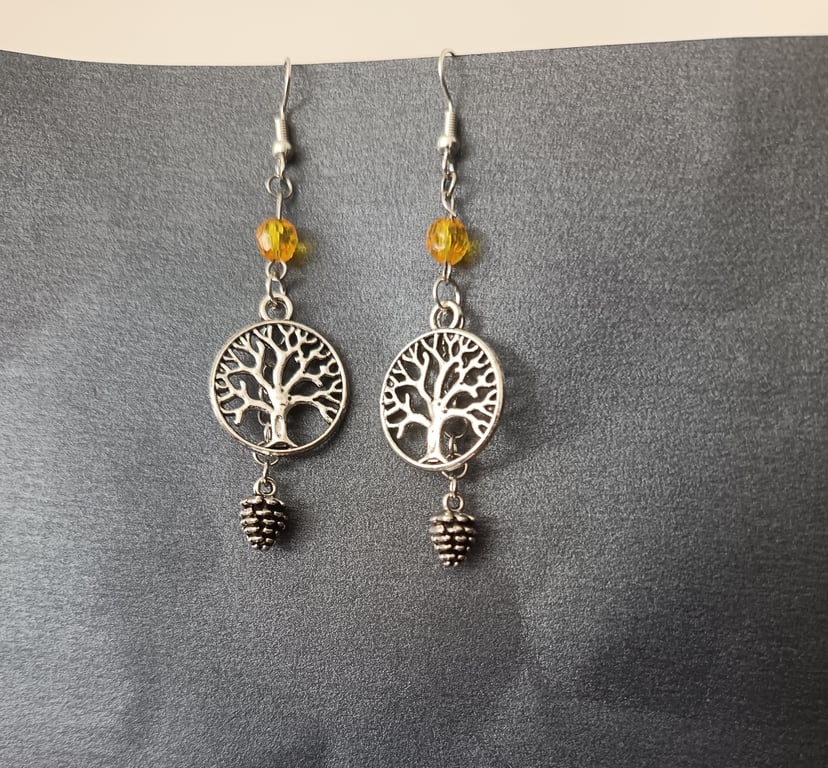 Silver tree of life and pine cone dangle earring with amber bead detail 