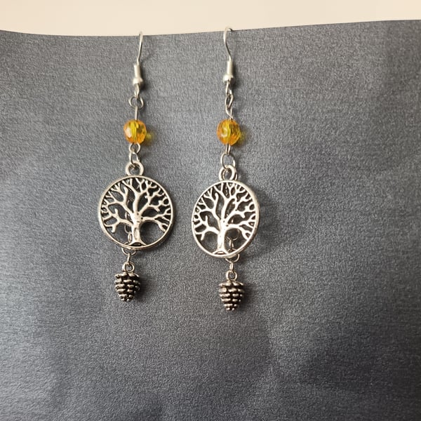 Silver tree of life and pine cone dangle earring with amber bead detail 