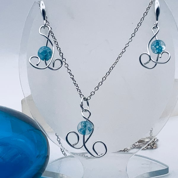 Inexpensive tiny aqua coloured jewellery earrings and pendant set