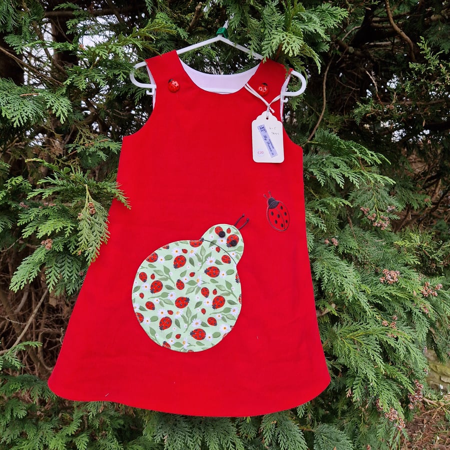 Age: 4-5yr Red Ladybird Needlecord dress. 