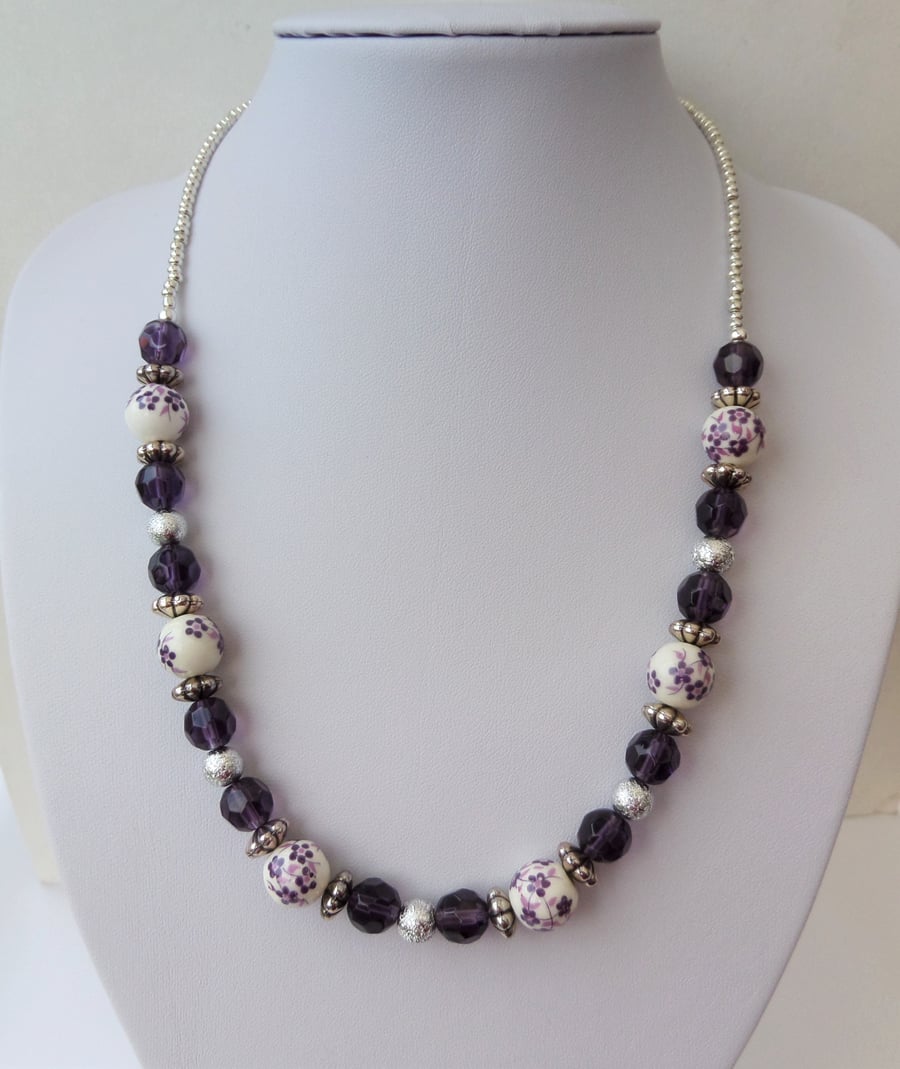 Purple and silver ceramic, acrylic and glass bead necklace