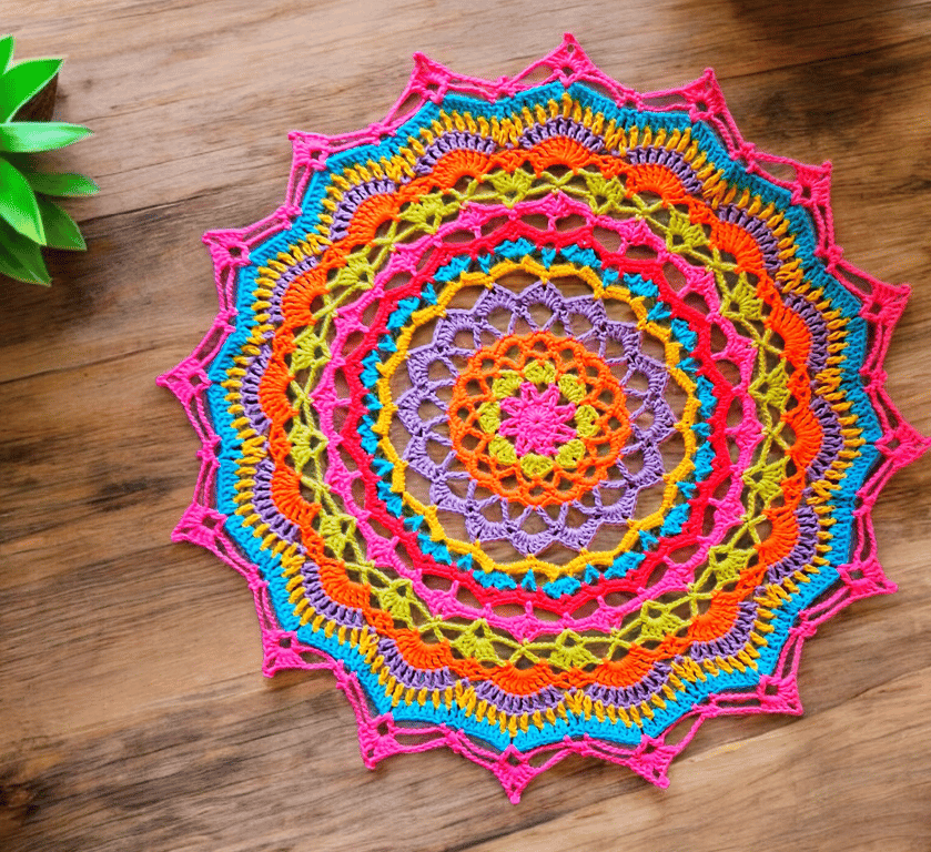 Large, bright crochet mandala doily table mat
