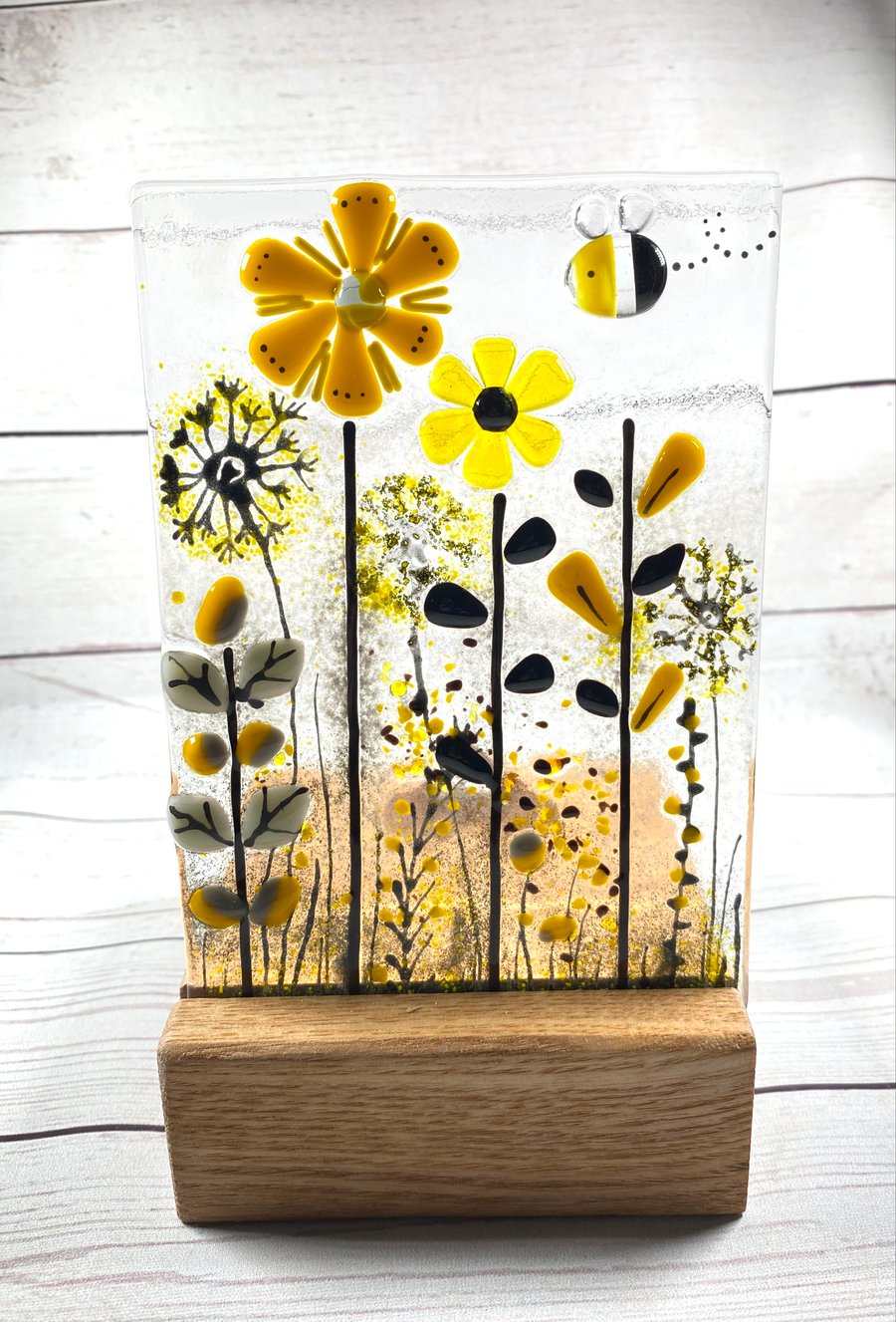 Yellow and grey free standing floral glass art