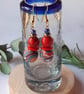 Handmade dangly polymer clay earrings  in red, blue and tangerine swirl