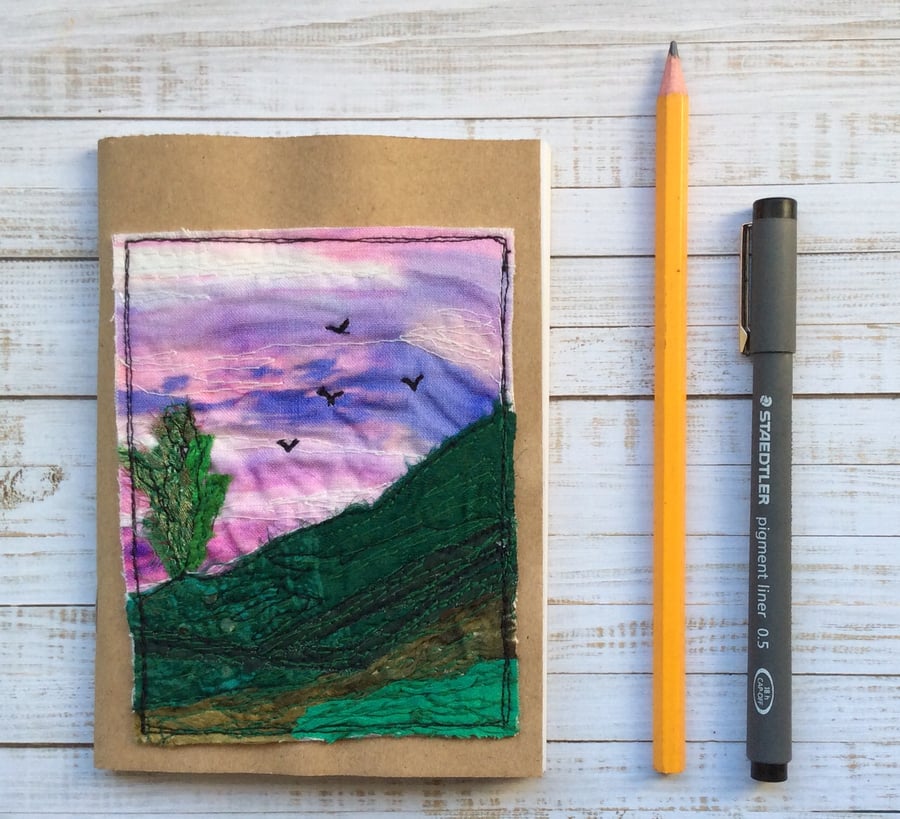 A6 embroidered sunset landscape sketchbook, journal or scrapbook. 
