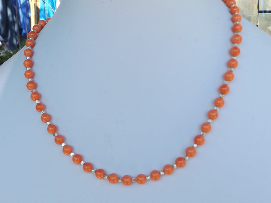 Peach coloured shell pearl 18" necklace with silver flash spacers