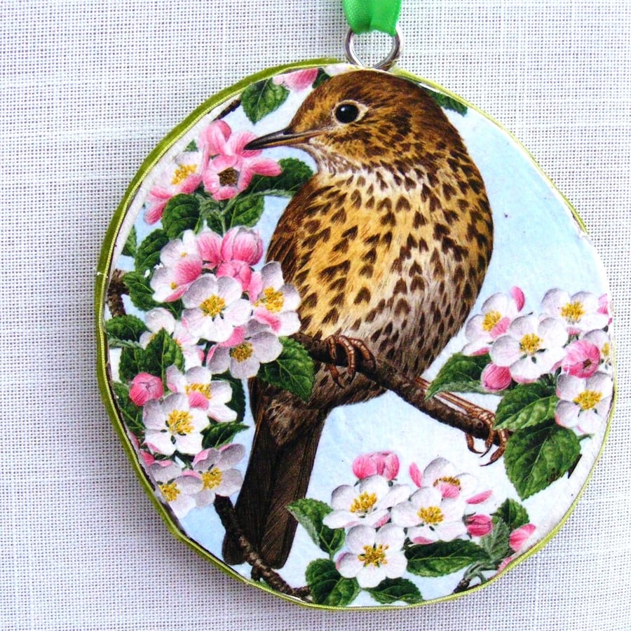 Birds decoupaged log slice wall decoration.