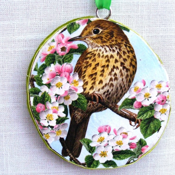 Birds decoupaged log slice wall decoration.