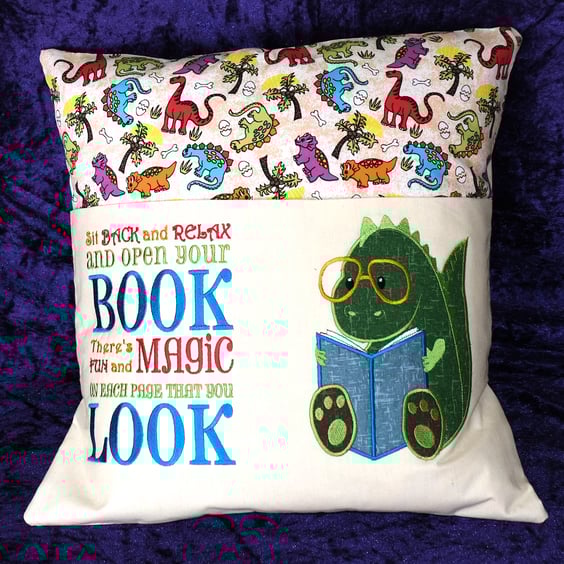 Embroidered dinosaur reading cushion 